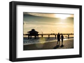 Loving Couple walking along the Beach at Sunset-Philippe Hugonnard-Framed Photographic Print