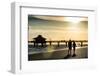 Loving Couple walking along the Beach at Sunset-Philippe Hugonnard-Framed Photographic Print