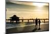 Loving Couple walking along the Beach at Sunset-Philippe Hugonnard-Mounted Photographic Print