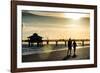 Loving Couple walking along the Beach at Sunset-Philippe Hugonnard-Framed Photographic Print