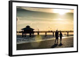 Loving Couple walking along the Beach at Sunset-Philippe Hugonnard-Framed Photographic Print