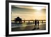 Loving Couple walking along the Beach at Sunset-Philippe Hugonnard-Framed Photographic Print