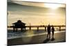 Loving Couple walking along the Beach at Sunset-Philippe Hugonnard-Mounted Photographic Print