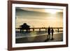 Loving Couple walking along the Beach at Sunset-Philippe Hugonnard-Framed Photographic Print