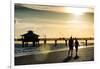 Loving Couple walking along the Beach at Sunset-Philippe Hugonnard-Framed Photographic Print