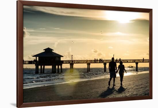 Loving Couple walking along the Beach at Sunset-Philippe Hugonnard-Framed Photographic Print