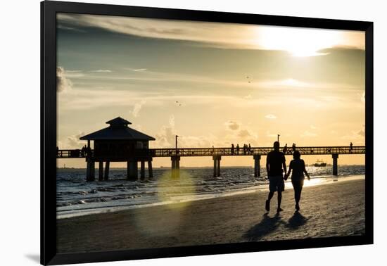 Loving Couple walking along the Beach at Sunset-Philippe Hugonnard-Framed Photographic Print