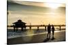 Loving Couple walking along the Beach at Sunset-Philippe Hugonnard-Stretched Canvas