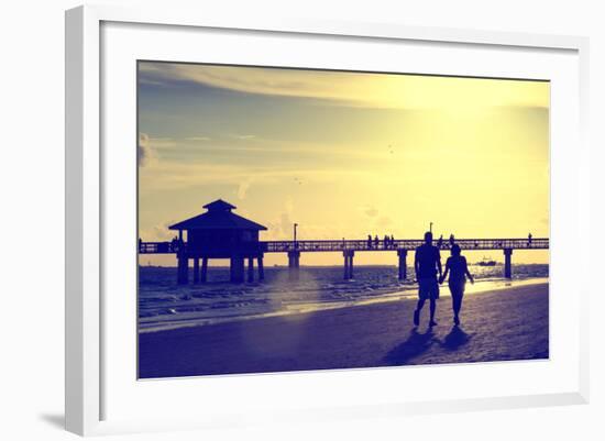 Loving Couple walking along the Beach at Sunset-Philippe Hugonnard-Framed Photographic Print