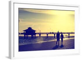 Loving Couple walking along the Beach at Sunset-Philippe Hugonnard-Framed Photographic Print