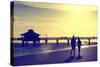Loving Couple walking along the Beach at Sunset-Philippe Hugonnard-Stretched Canvas