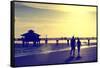 Loving Couple walking along the Beach at Sunset-Philippe Hugonnard-Framed Stretched Canvas