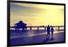 Loving Couple walking along the Beach at Sunset-Philippe Hugonnard-Framed Photographic Print