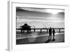 Loving Couple walking along the Beach at Sunset-Philippe Hugonnard-Framed Photographic Print