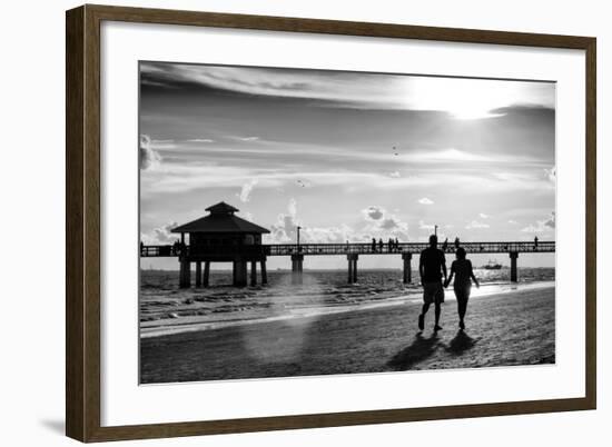 Loving Couple walking along the Beach at Sunset-Philippe Hugonnard-Framed Photographic Print