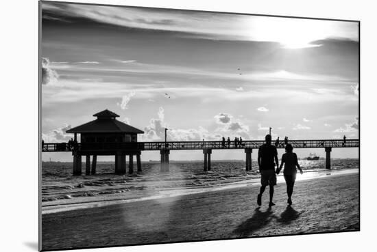 Loving Couple walking along the Beach at Sunset-Philippe Hugonnard-Mounted Photographic Print