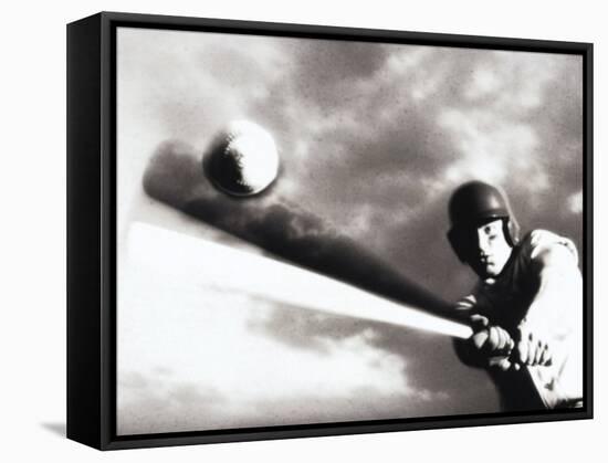 Low Angle View of a Baseball Player Swinging a Baseball Bat-null-Framed Stretched Canvas