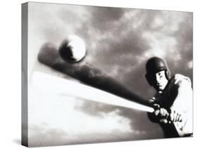 Low Angle View of a Baseball Player Swinging a Baseball Bat-null-Stretched Canvas