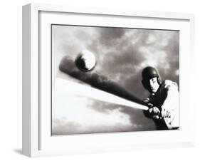 Low Angle View of a Baseball Player Swinging a Baseball Bat-null-Framed Photographic Print
