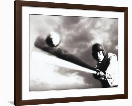 Low Angle View of a Baseball Player Swinging a Baseball Bat-null-Framed Photographic Print