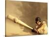 Low Angle View of a Baseball Player Swinging a Baseball Bat-null-Stretched Canvas