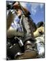 Low Angle View of a Biker on a Motorcycle-null-Mounted Photographic Print