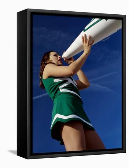 Low Angle View of a Cheerleader Holding a Bullhorn-null-Framed Stretched Canvas