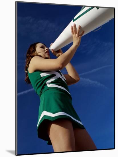 Low Angle View of a Cheerleader Holding a Bullhorn-null-Mounted Photographic Print