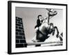 Low Angle View of a Jockey And a Horse Jumping Over a Hurdle-null-Framed Photographic Print