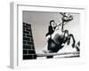 Low Angle View of a Jockey And a Horse Jumping Over a Hurdle-null-Framed Photographic Print