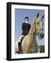 Low Angle View of a Jockey Sitting on a Horse-null-Framed Photographic Print