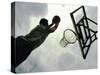 Low Angle View of a Man Shooting a Basket-null-Stretched Canvas