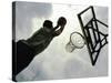 Low Angle View of a Man Shooting a Basket-null-Stretched Canvas