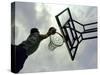 Low Angle View of a Man Shooting a Basket-null-Stretched Canvas