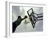 Low Angle View of a Man Shooting a Basket-null-Framed Premium Photographic Print