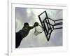 Low Angle View of a Man Shooting a Basket-null-Framed Photographic Print