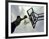 Low Angle View of a Man Shooting a Basket-null-Framed Photographic Print