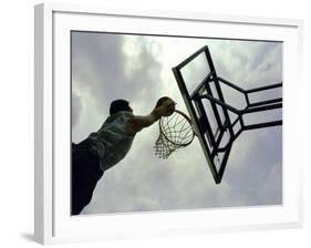 Low Angle View of a Man Shooting a Basket-null-Framed Photographic Print