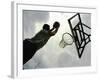 Low Angle View of a Man Shooting a Basket-null-Framed Photographic Print