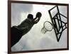 Low Angle View of a Man Shooting a Basket-null-Framed Photographic Print