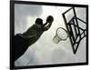 Low Angle View of a Man Shooting a Basket-null-Framed Photographic Print