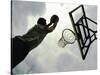 Low Angle View of a Man Shooting a Basket-null-Stretched Canvas