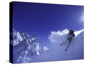 Low Angle View of a Man Skiing-null-Stretched Canvas