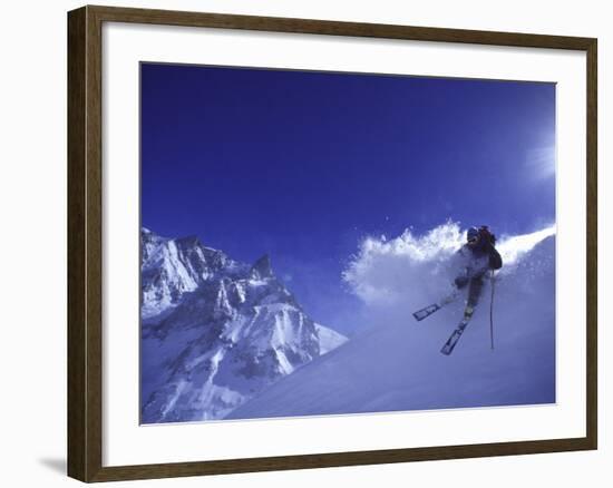 Low Angle View of a Man Skiing-null-Framed Photographic Print