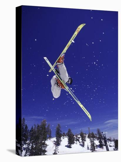 Low Angle View of a Skier in Mid Air-null-Stretched Canvas