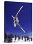 Low Angle View of a Skier in Mid Air-null-Stretched Canvas
