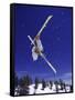 Low Angle View of a Skier in Mid Air-null-Framed Stretched Canvas