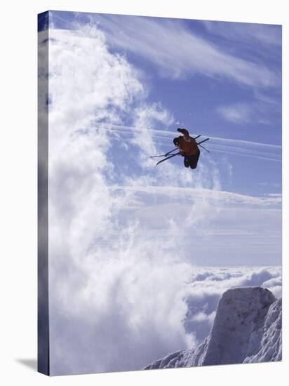 Low Angle View of a Skier in Mid Air-null-Stretched Canvas