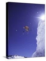 Low Angle View of a Skier in Mid Air-null-Stretched Canvas