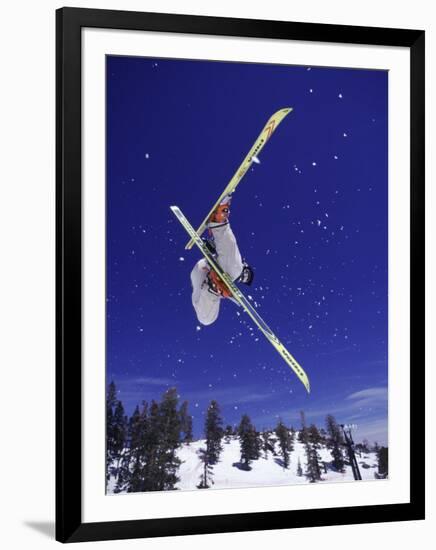 Low Angle View of a Skier in Mid Air-null-Framed Photographic Print